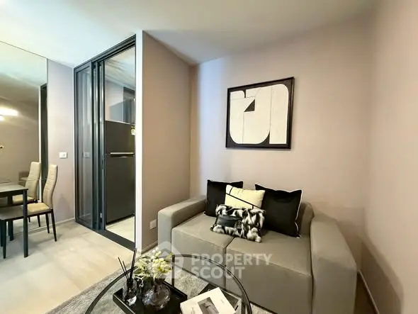 Modern living room with stylish decor and open dining area