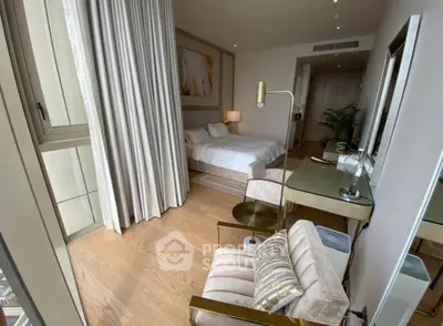 Luxurious bedroom with elegant decor and large windows for natural light