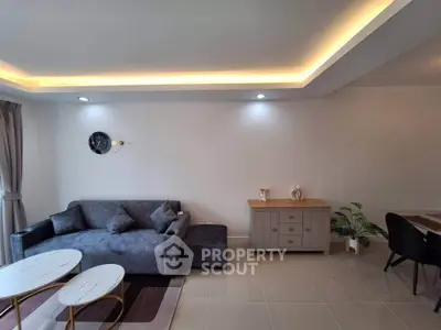 Modern living room with stylish furniture and elegant lighting
