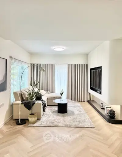 Elegant living room with modern decor and cozy seating area