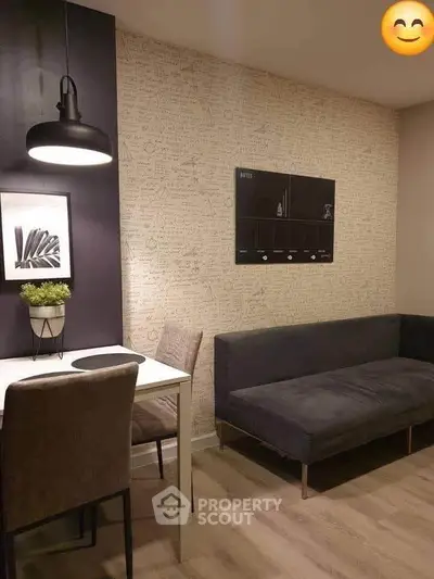 Modern living room with stylish decor and cozy seating area, perfect for relaxation and entertaining.