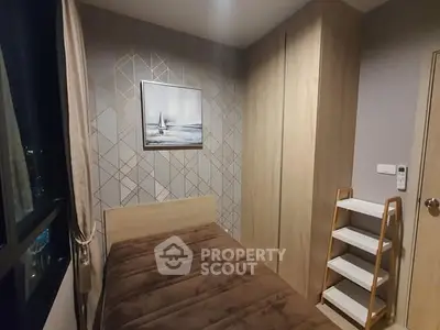 Cozy bedroom with modern decor and ample storage space