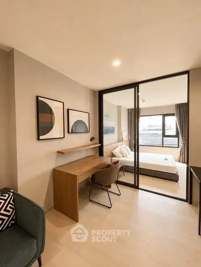 Modern bedroom with study area and stylish decor in a contemporary apartment