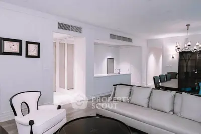 Elegant living room with modern furniture and stylish decor in a luxury apartment.
