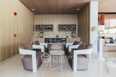 Modern living room with stylish furniture and wooden accents, perfect for relaxation and entertaining.