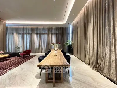 Luxurious modern living room with elegant dining area and floor-to-ceiling curtains
