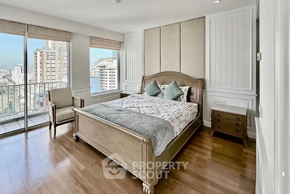 Luxurious bedroom with city view and elegant wooden furniture