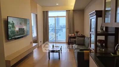 Modern living room with city view, sleek furniture, and wall-mounted TV in a high-rise apartment.