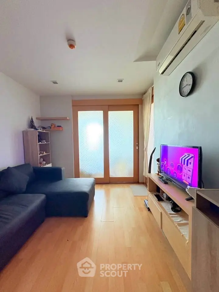 Cozy living room with modern decor and entertainment setup