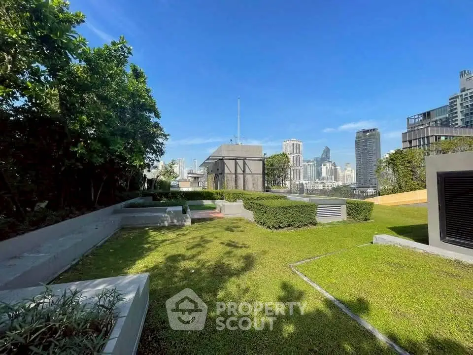 Stunning rooftop garden with city skyline views, perfect for relaxation and gatherings.