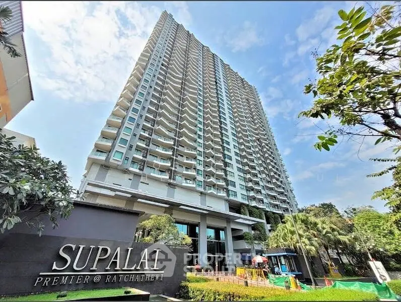 Stunning high-rise building with lush greenery at Supalai Premier Ratchathewi.