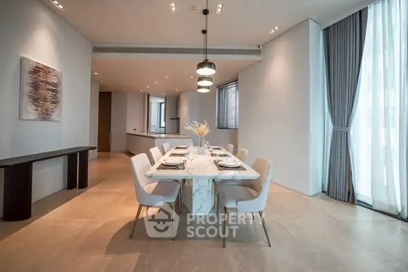 Luxurious dining area with elegant table and modern decor