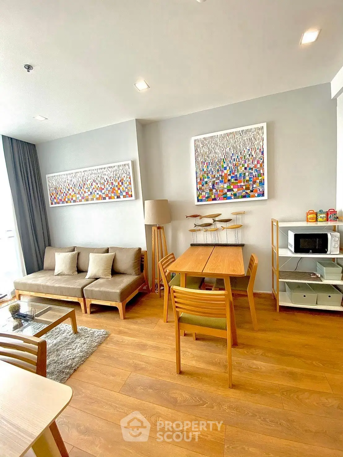 Modern living room with stylish decor and wooden flooring