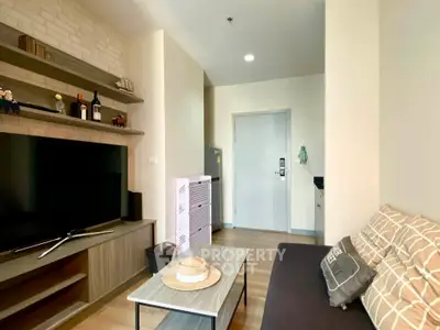 Modern living room with cozy sofa and entertainment center in stylish apartment
