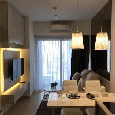 Modern living room with stylish lighting and cozy seating area