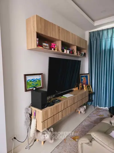 Modern living room with stylish TV unit and elegant decor
