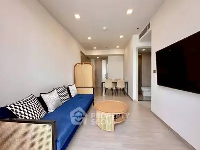 Modern living room with stylish furniture and open layout, perfect for urban living.