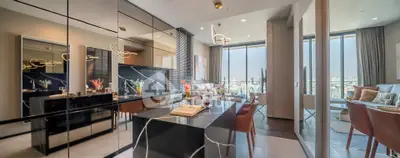 Luxurious modern living room with panoramic city views and elegant dining area.