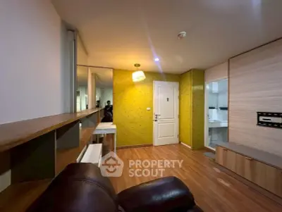 Modern living room with stylish wooden flooring and contemporary decor