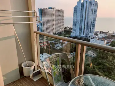 Stunning high-rise balcony view with ocean and cityscape panorama