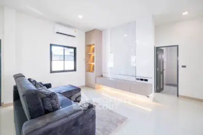 Modern living room with sleek design and plush seating