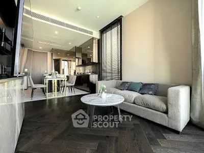 Luxurious modern living room with elegant decor and open dining area