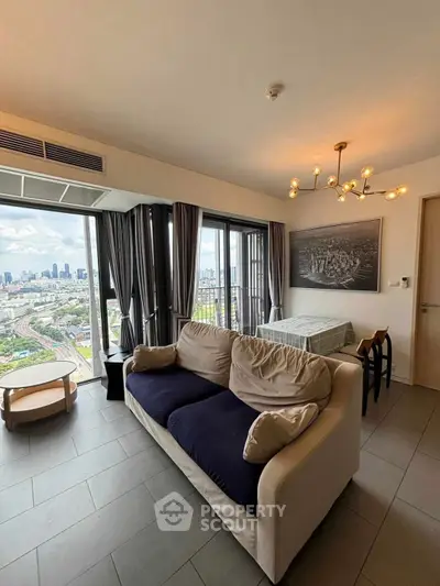 Modern living room with stunning city view and elegant decor