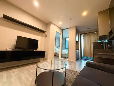 Modern living room with sleek furniture and open layout in a stylish apartment