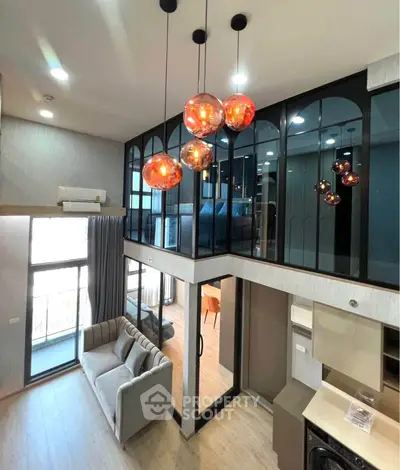Stunning modern loft with high ceilings and elegant lighting, featuring a cozy living area and stylish mezzanine bedroom.