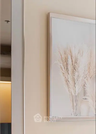 Elegant interior wall art with neutral tones in a modern living space.