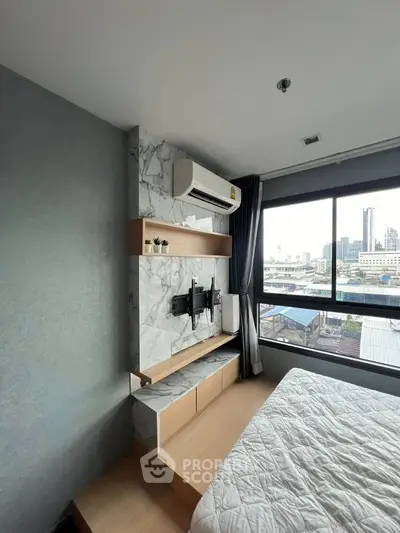 Modern bedroom with city view and stylish decor