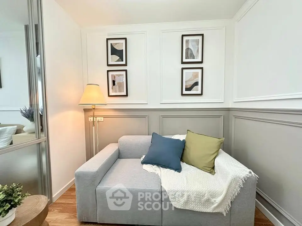 Cozy living room with stylish decor and comfortable sofa, perfect for relaxation.
