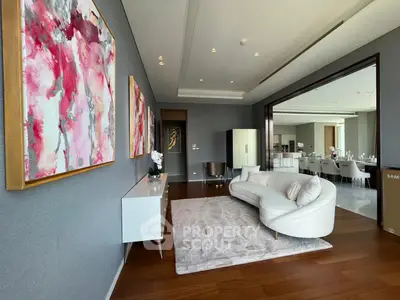 Luxurious modern living room with elegant decor and open dining area
