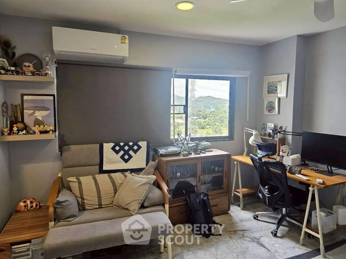 Cozy study room with modern desk and scenic window view