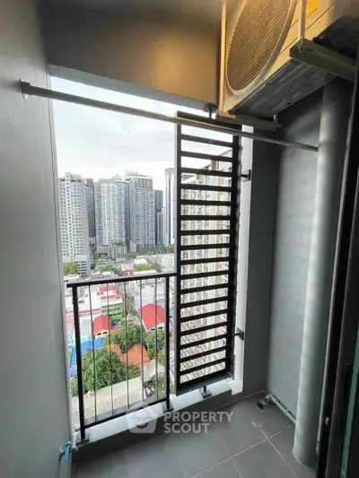 Modern balcony with city view in high-rise apartment