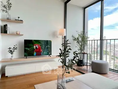 Modern living room with large windows and balcony offering stunning city views, featuring stylish decor and wooden flooring.