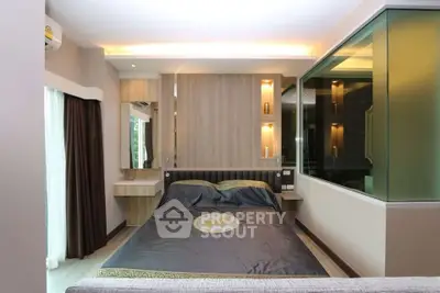 Luxurious modern bedroom with elegant decor and ambient lighting
