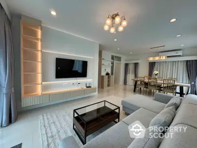 Spacious modern living room with elegant decor and large sectional sofa