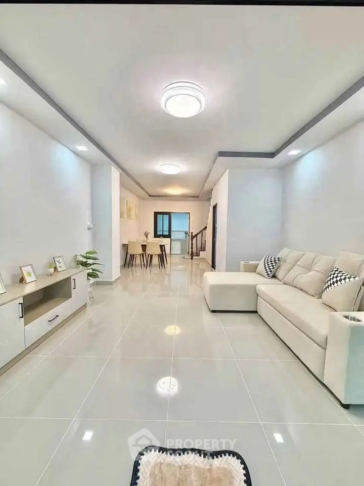 Spacious modern living room with elegant decor and open layout