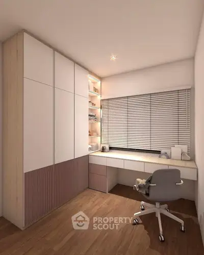 Modern study room with sleek desk and storage cabinets, perfect for productivity.
