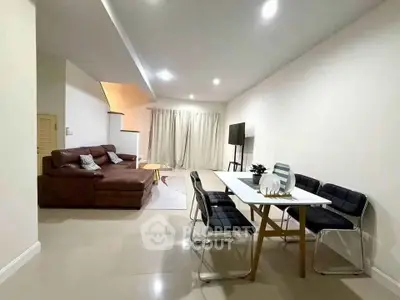 Modern living room with sleek furniture and open layout