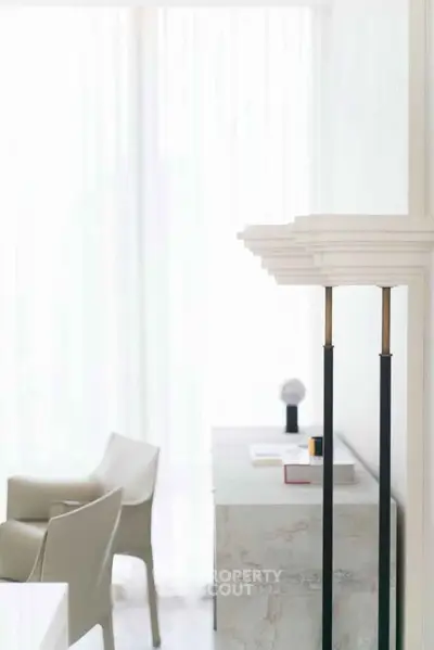 Modern minimalist interior with elegant furniture and soft natural lighting