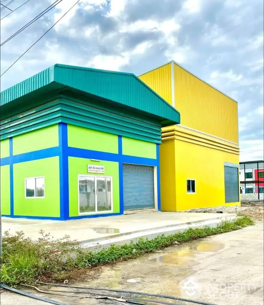 Vibrant commercial building with colorful facade and spacious layout