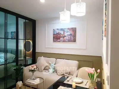 Chic living room with elegant decor and cozy ambiance, featuring modern lighting and stylish furniture.