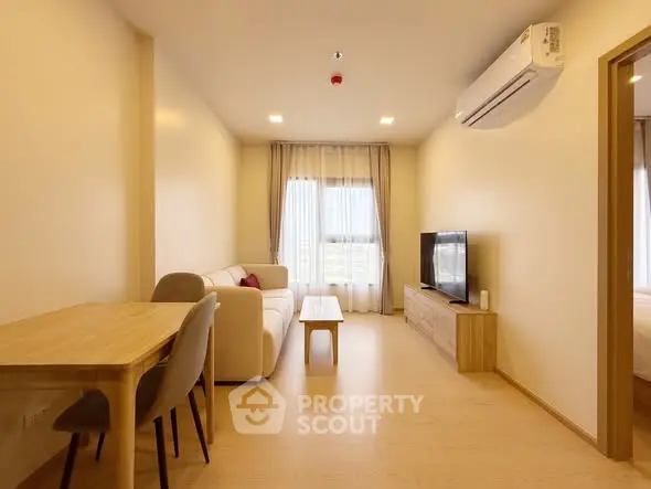 Modern living room with minimalist furniture and natural light