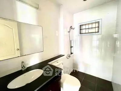 Modern bathroom with sleek fixtures and natural light