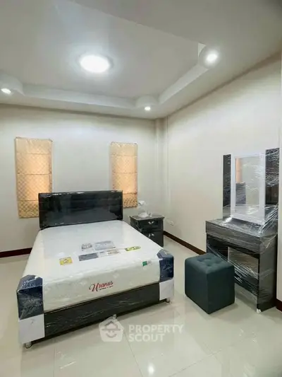 Modern bedroom with sleek furniture and ambient lighting