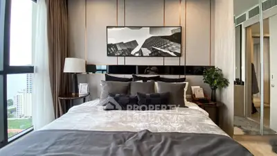 Luxurious bedroom with modern decor and stunning city view