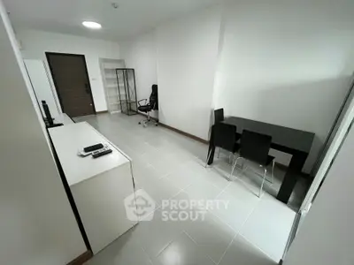 Modern minimalist apartment interior with sleek furniture and open layout, perfect for urban living.
