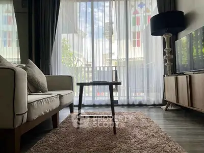 Chic living room with modern decor and large window view